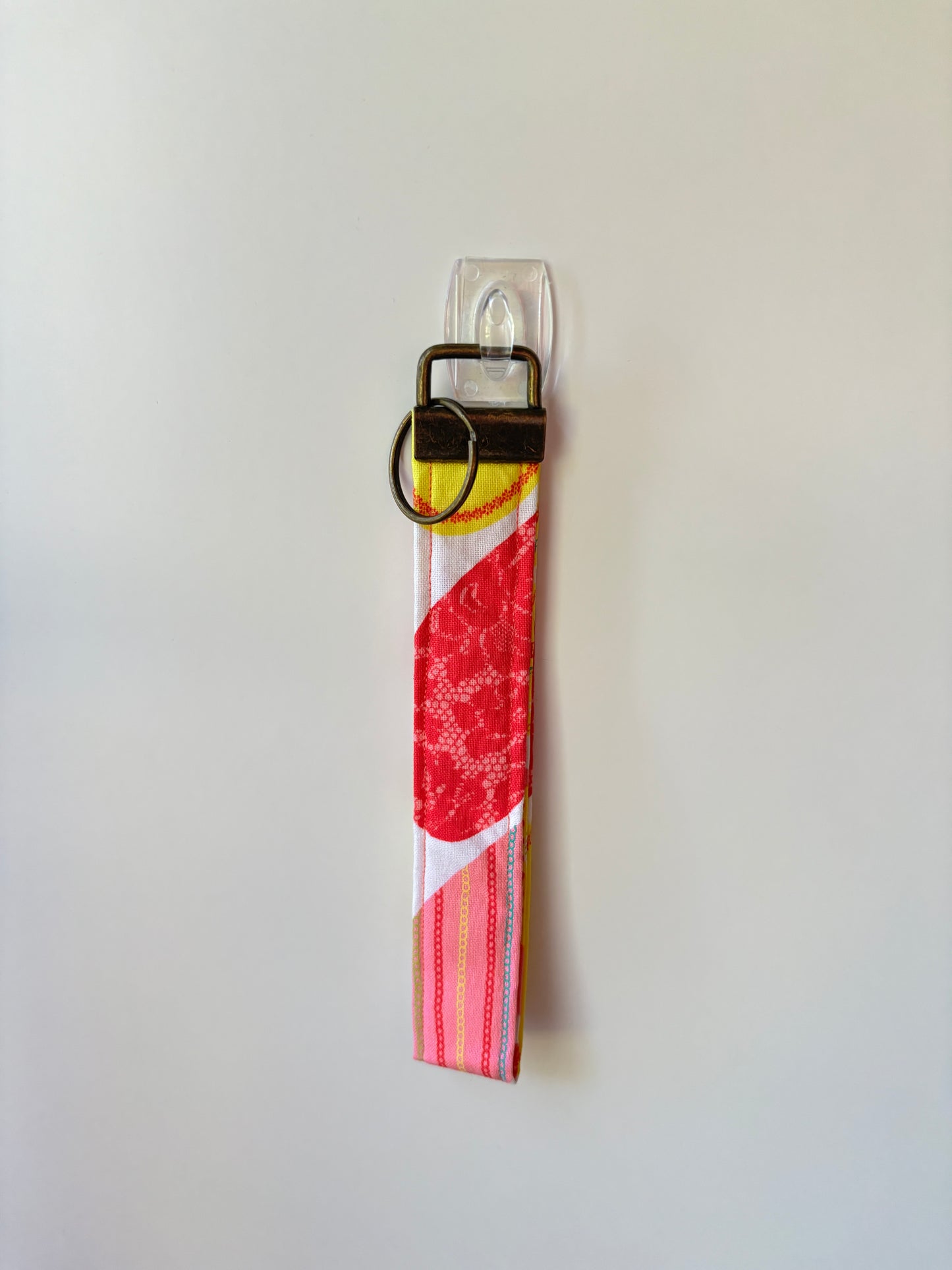 Neon heart wristlet