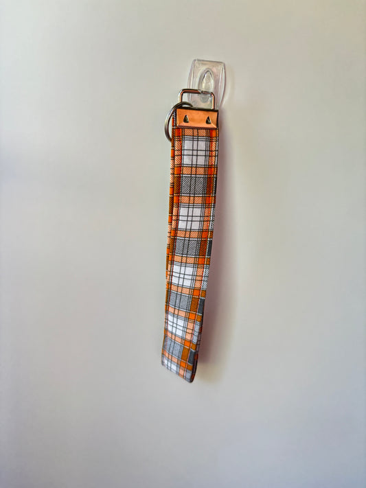 Grey & orange plaid wristlet