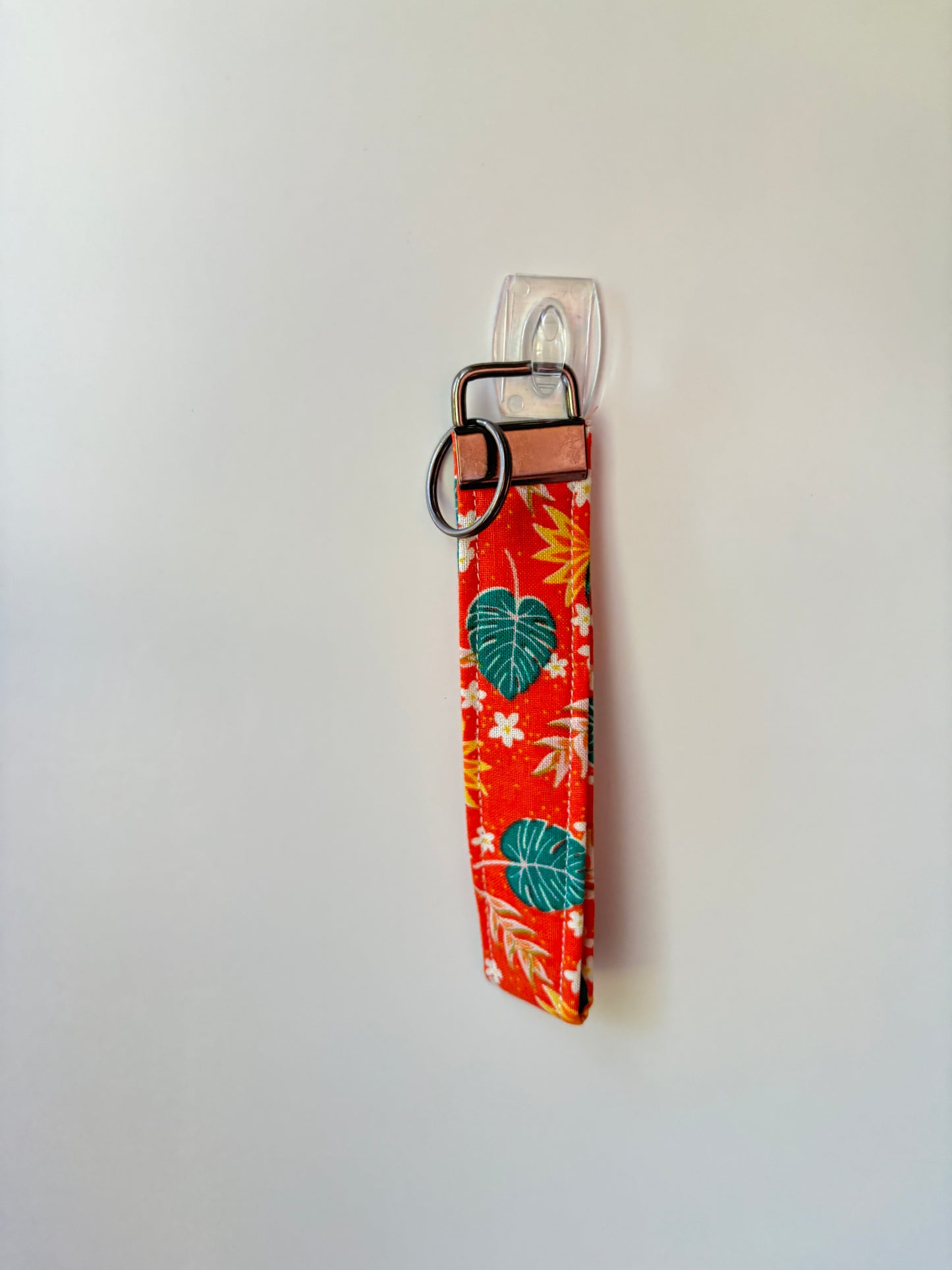 Orange tropical wristlet