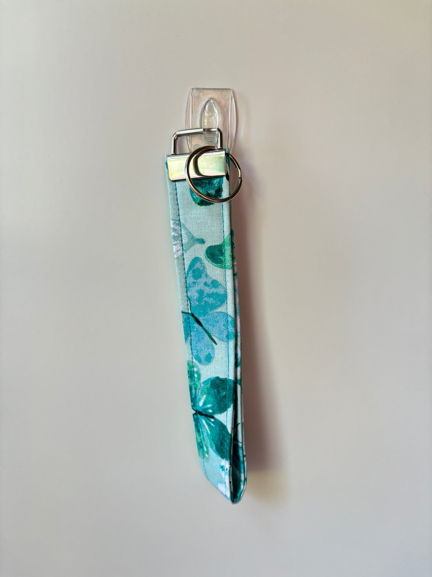 Teal butterfly wristlet